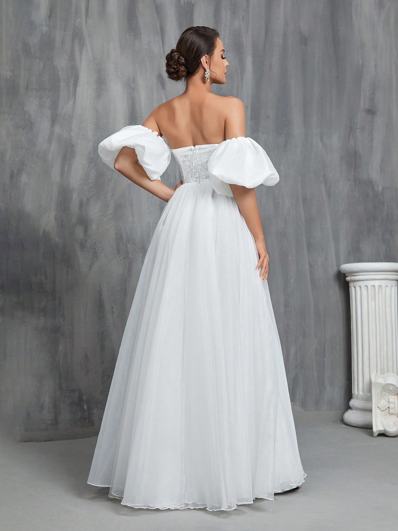 Robe de mariée princesse volumineuse paillette de dos