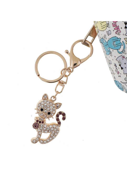 Porte clé chat strass dore