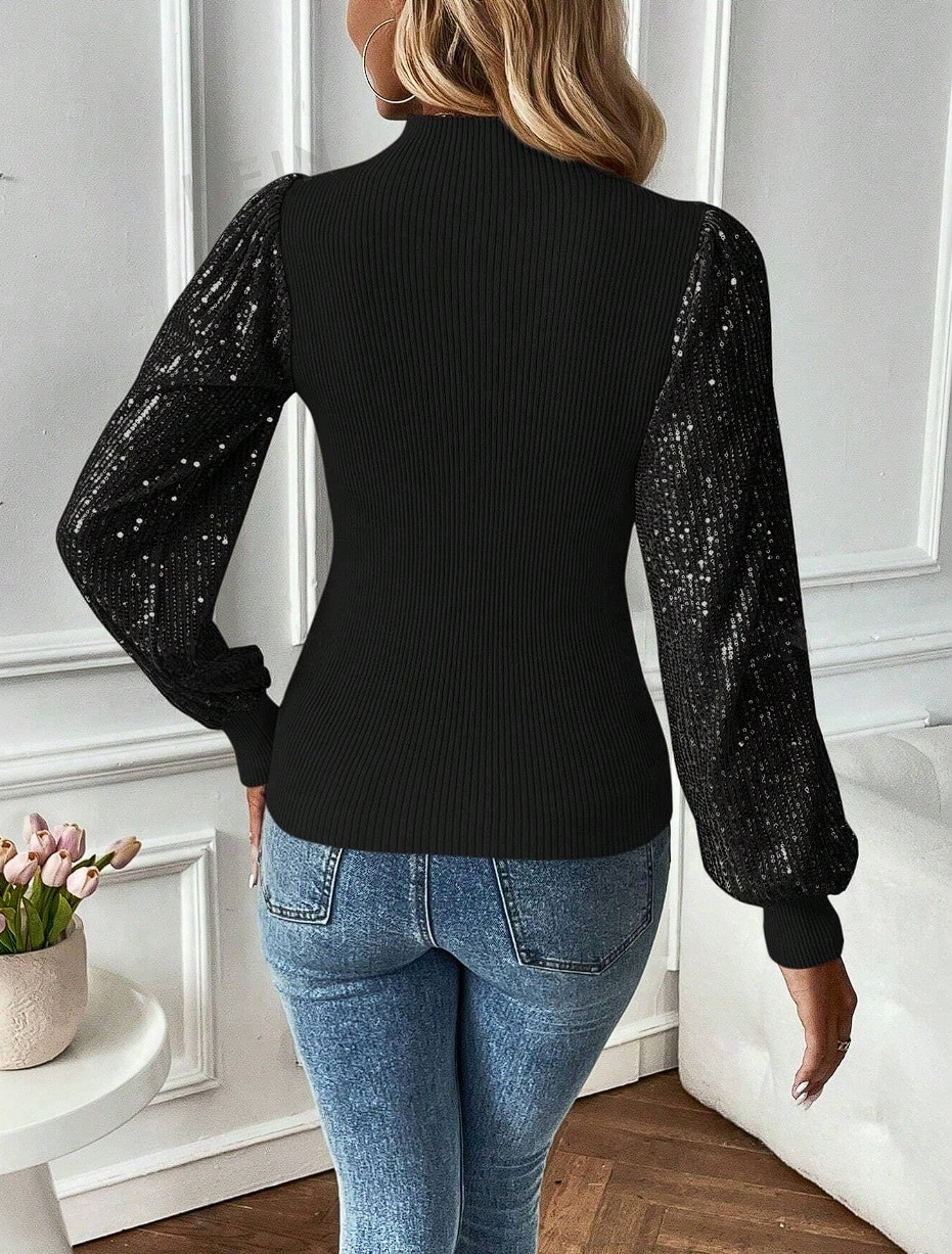 Pull noir pailleté femme de derrière 